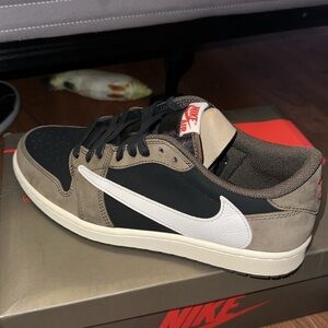 Jordan 1 Lows Travis Scott mocahs. Never used still brand new.